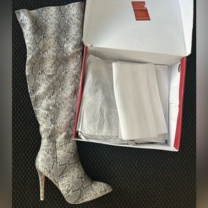 Snake print thigh high boots